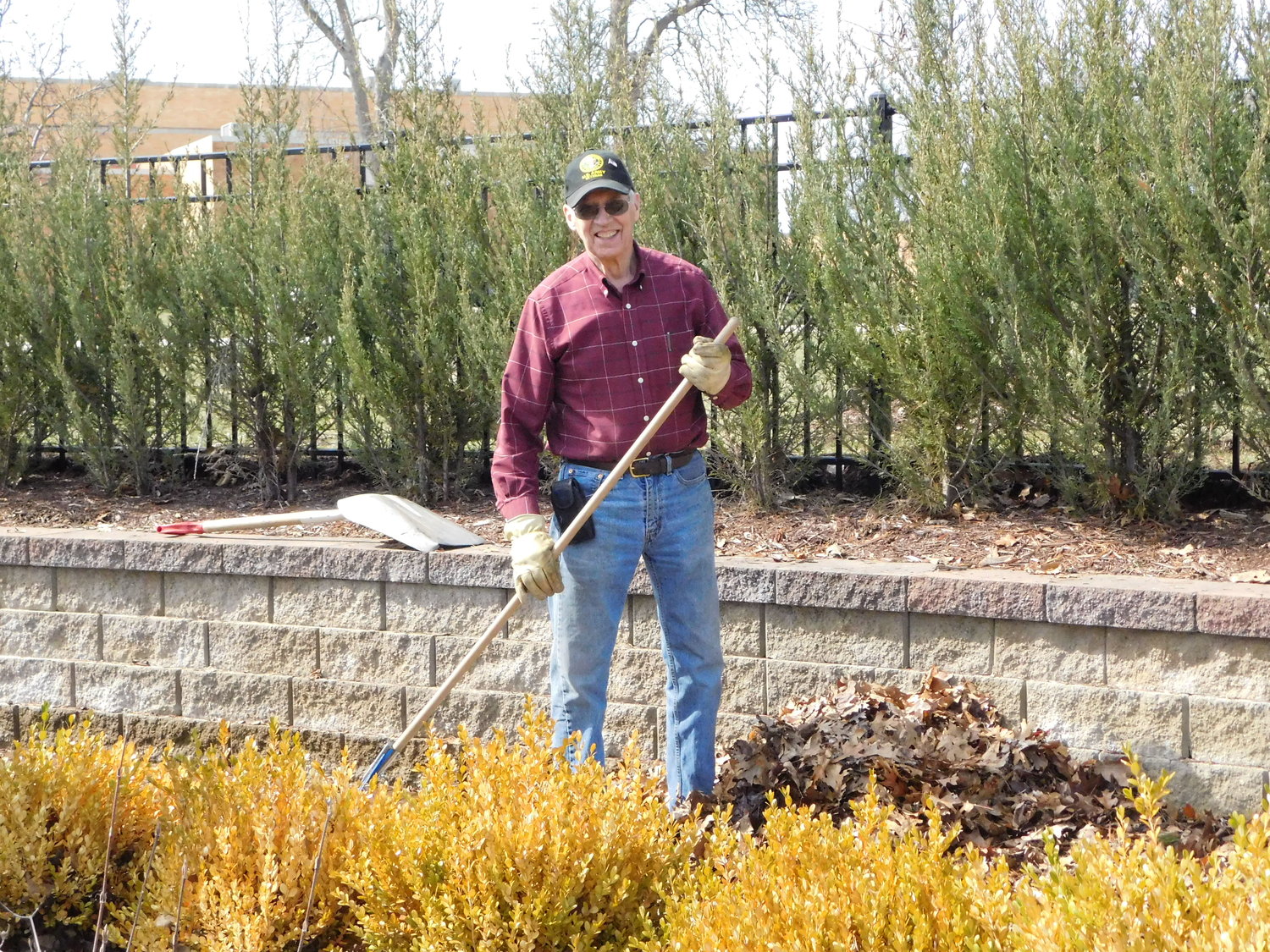 Gene Payne is a man with a rake – and a mission – during spring cleanup at Veterans Freedom Park
